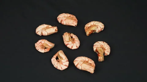 Unpeeled Dried Shrimp Shell On Rotating On Black Background Stock Footage 337783505