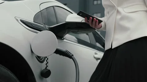 Unplug EV app phone Stock Footage 164528607