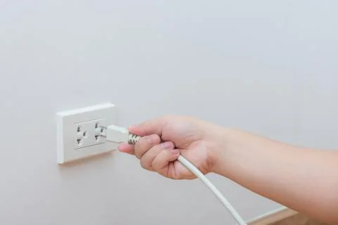 Unplug or plugged in concept Stock Photos
