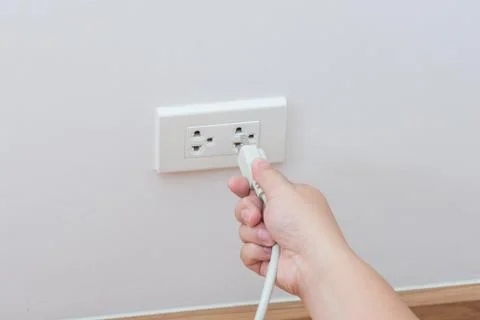 Unplug or plugged in concept Stock Photos