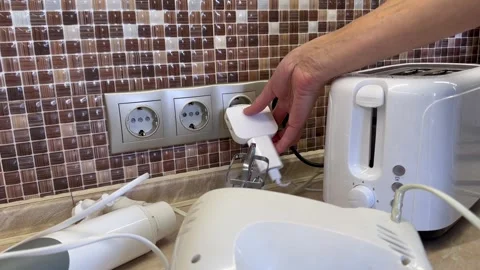 Unplugging All Electrical Appliances to Save Energy at Home Видео 346744862