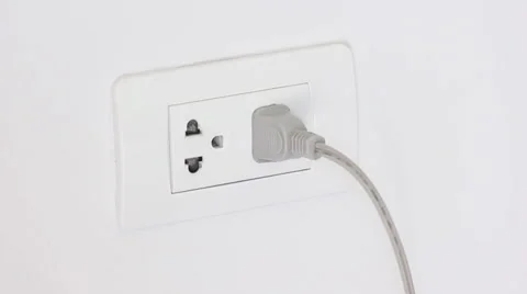 Unplugging Cord From Outlet To Save Electrical Energy Video stock 65816877