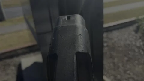 Unplugging EV Charger Cable From Electric Vehicle Video stock 347032334