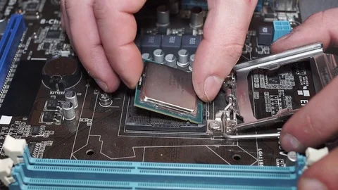 Unplugging a Processor from the Motherboard Stock Footage 72679739
