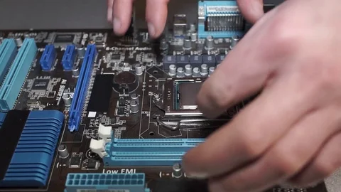 Unplugging a Processor from the Motherboard Stock Footage 72679774