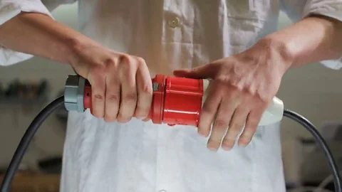 Unplugging two plugs Stock-Footage 69167060