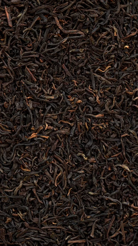 Unpressed pu-erh tea background. Seamless loop. Vertical video. Stock Footage 277609886