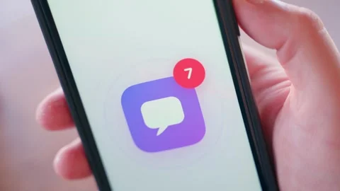 Unread message counter growing on smartphone app icon close-up. Notification Video stock 342735137