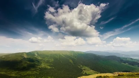Unreal clouds in the mountains Stock Footage 79915919