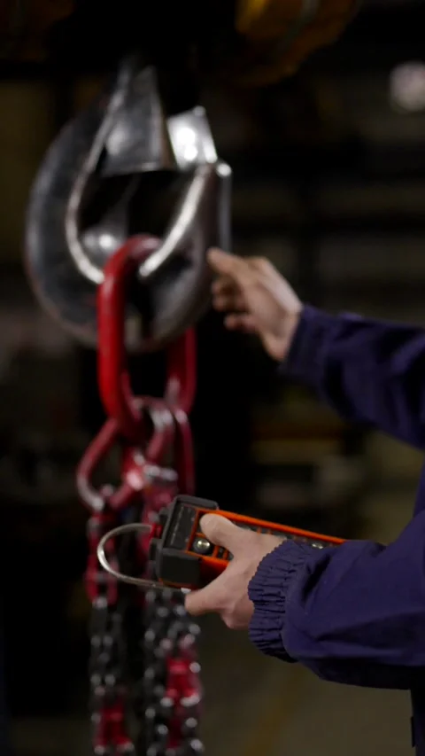 Unrecognisable person using remote control to move a crane Stock Footage 266184516