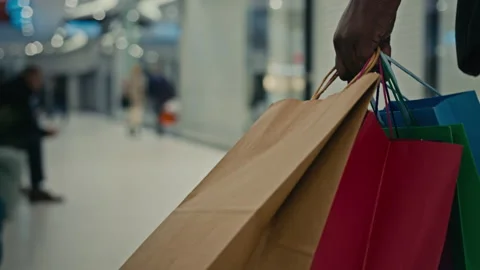 Unrecognizable African unknown man customer buyer businessman male legs with Video stock 221131352