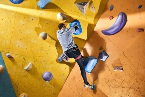 Unrecognizable athletic mountaineer without forearm training indoors Stock Photos