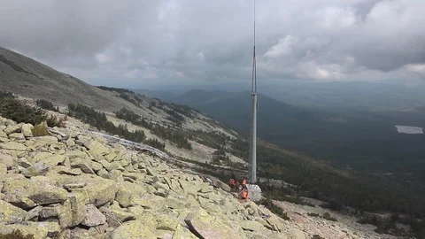 Unrecognizable builders in orange vests Stock Footage 114943917