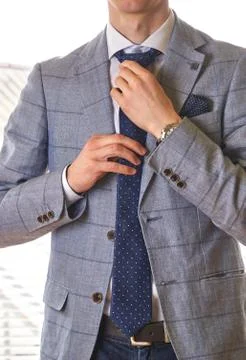 Unrecognizable businessman getting dressed for work Foto stock