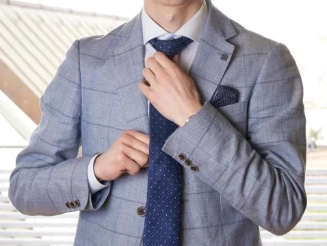 Unrecognizable businessman getting dressed for work Stock Photos