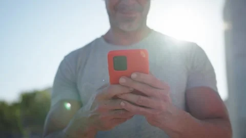 Unrecognizable cheerful Caucasian middle aged muscular man standing with red Stock Footage 264768583