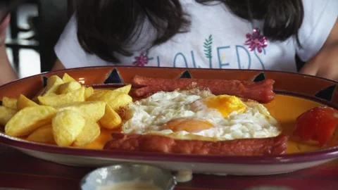 Unrecognizable Child with Eggs: Culinary Creativity Video stock 258294008