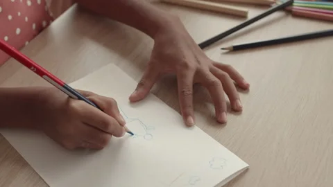 Unrecognizable Child Learning Drawing | Stock Video | Pond5