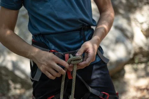 Unrecognizable climber preparing for climbing Stock Photos