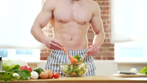 Unrecognizable close up portrait. Handsome fit man with naked torso mixing green Stock Footage 143754892