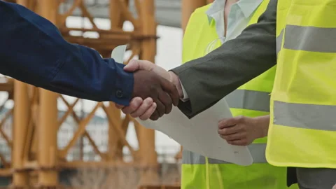 Unrecognizable Construction Site Workers Shaking Hands Video stock 161951545