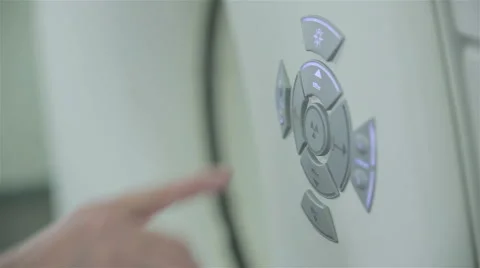 Unrecognizable doctor hands operates with Computerized Tomography CT MRI Scanner Stock Footage 66356182