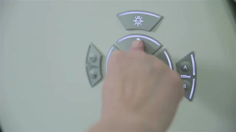 Unrecognizable doctor hands operates with Computerized Tomography CT MRI Scanner Video stock 67114422