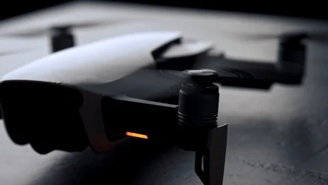 Unrecognizable drone quadcopter with digital camera Stock Footage 103430424