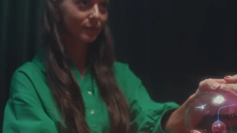 Unrecognizable Fortune Teller Asking Woman to Put Hand on Crystal Ball Stock Footage 253183554
