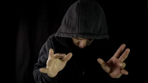 Unrecognizable hacker man stretching his hands  Video stock 275360696