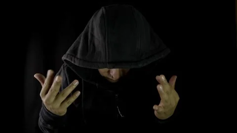 Unrecognizable hacker man stretching his hands  Stock Footage 275360712