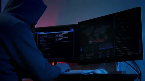 Unrecognizable hacker man typing on keyboard and engaging hacking into security Stock Footage 189226458