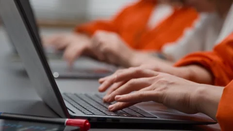 Unrecognizable Inmates Typing on Keyboards during Computer Class Stock Footage 329002092