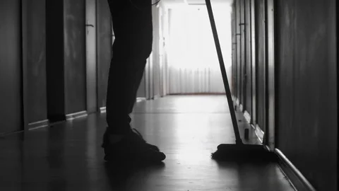 Unrecognizable Janitor Sweeping Floor Vidéo 77955372