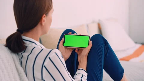 Unrecognizable lady using cellphone Video stock 207477965