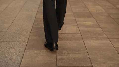 Unrecognizable male going Stock Footage 90694017