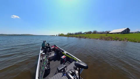 Unrecognizable man casting rod and spinning fishing reel on small fishing b.. Stock Footage 341779871