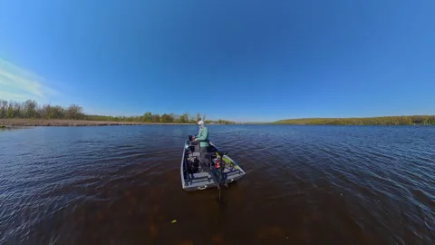 Unrecognizable man casting rod and spinning fishing reel on small fishing b.. Stock Footage 341780037