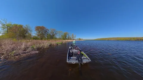 Unrecognizable man casting rod and spinning fishing reel on small fishing b.. Stock Footage 341780072