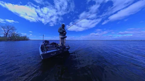 Unrecognizable man casting rod and spinning fishing reel on small fishing b.. Stock Footage 346310021