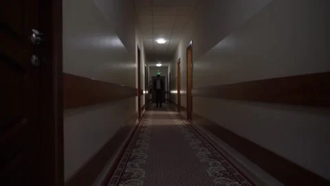 Unrecognizable Man In The Corridor Stock Footage 140358710