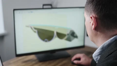 An unrecognizable man develops the design of a part. An engineer works with a 3D 스톡 동영상 195820733