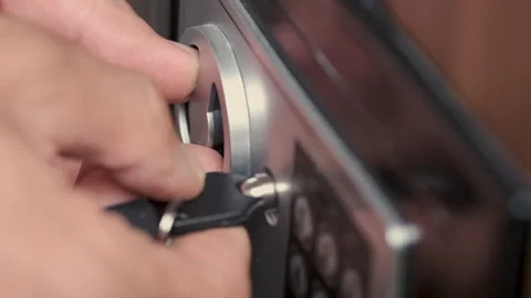 Unrecognizable Man Entering Code for Opening Safe Video stock 247376874