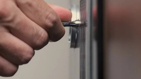 Unrecognizable Man Entering Code for Opening Safe Stock Footage 247400713