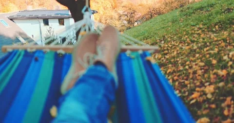 Unrecognizable Man Feet, Relax in a Hammock in Calm Autumn Outdoor. SLOW MOTION Stock Footage 140295609