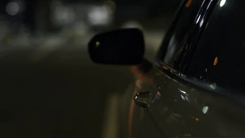 Unrecognizable man gets out of the car and turning on car alarm, safety system Stock Footage 106346554