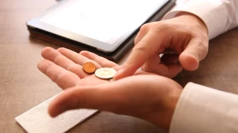 Unrecognizable man putting gratuity on the table in coffee bar Video stock 55038786