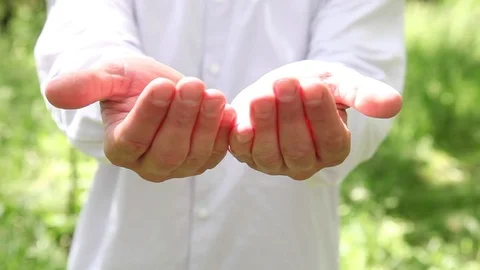Unrecognizable man showing his empty palm Video stock 71049312
