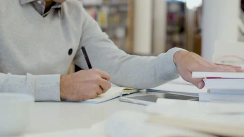 Unrecognizable man sitting at desk and studying Stock-Footage 232622308