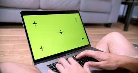 Unrecognizable man typing keyboard of laptop with mockup screen Stock Footage 170635213